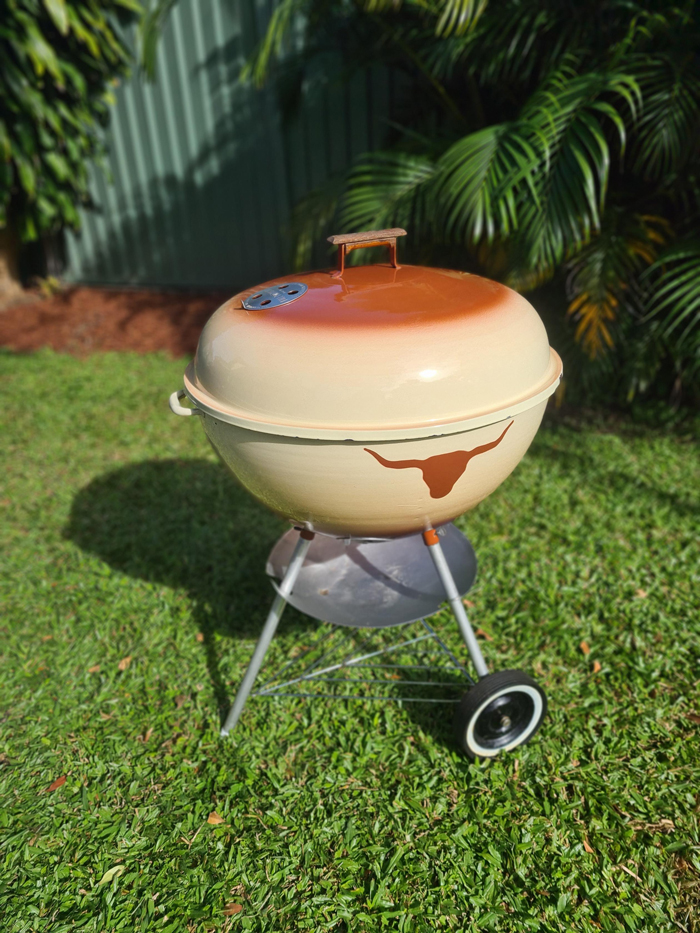 Cream and burnt orange Weber kettle with longhorn design