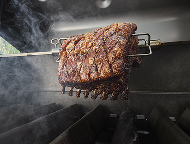 Rack of ribs turning on the rotisserie
