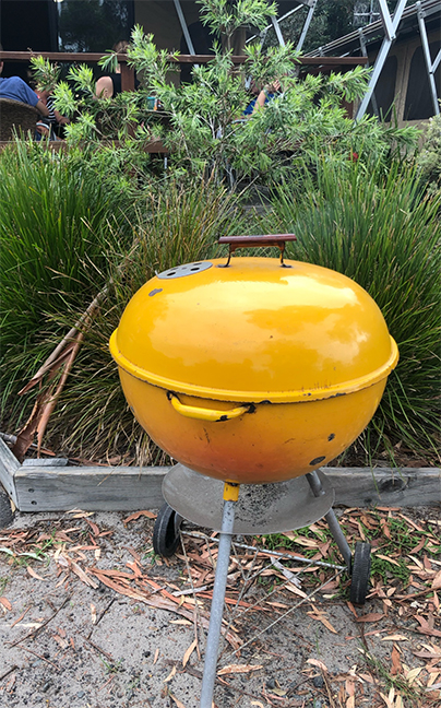 Joel Hogston's 1974 22 inch Yellow Weber kettle, known as The Gourmet