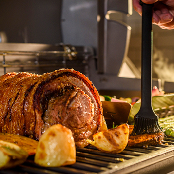 Roast cooking on a Weber barbecue