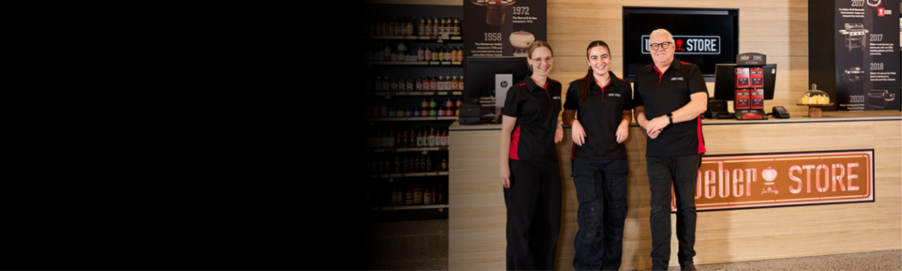 Weber Store team standing at the store counter