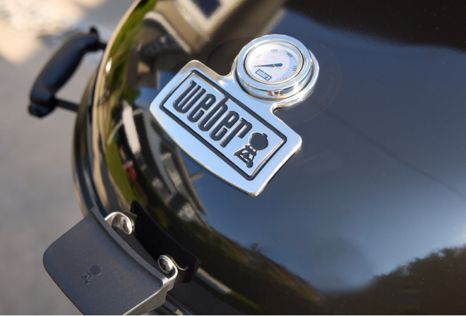 Porcelain‑enamelled Weber charcoal grill