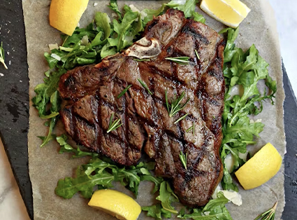 Tuscan T-Bone Steak with Arugula and Lemon 