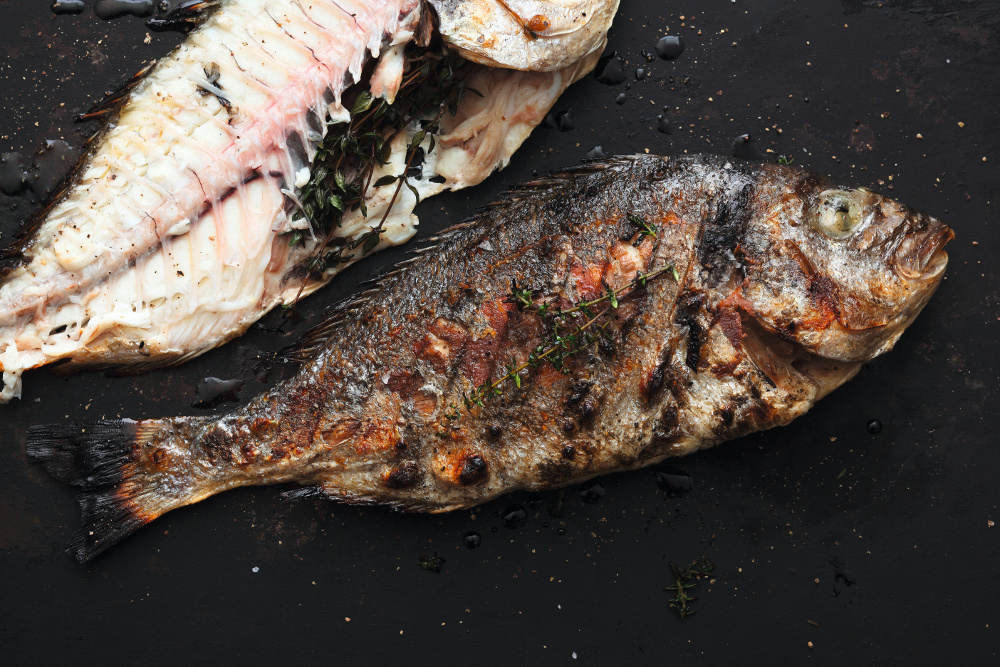  Hele dorade met citroen peterselie olie


